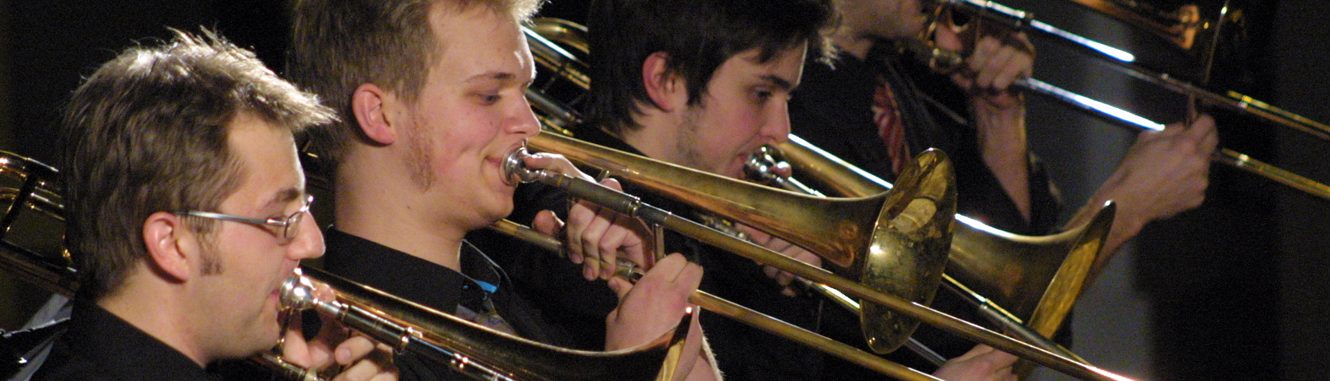 Männer mit Trompeten